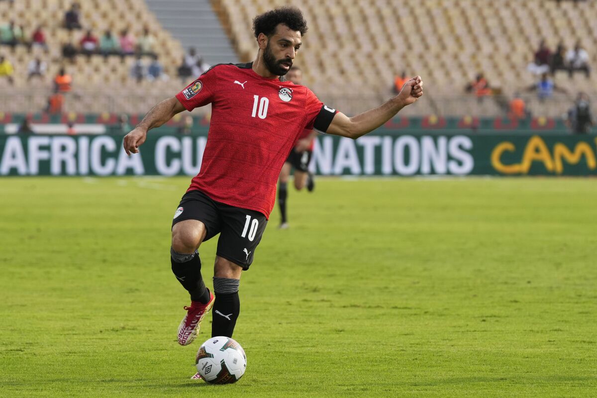 Egypt's Mohamed Salah controls the ball during the African Cup of Nations 2022 quarter-final soccer match between Egypt and Morocco at the Ahmadou Ahidjo stadium in Yaounde, Cameroon, Sunday, Jan. 30, 2022. (AP Photo/Themba Hadebe)