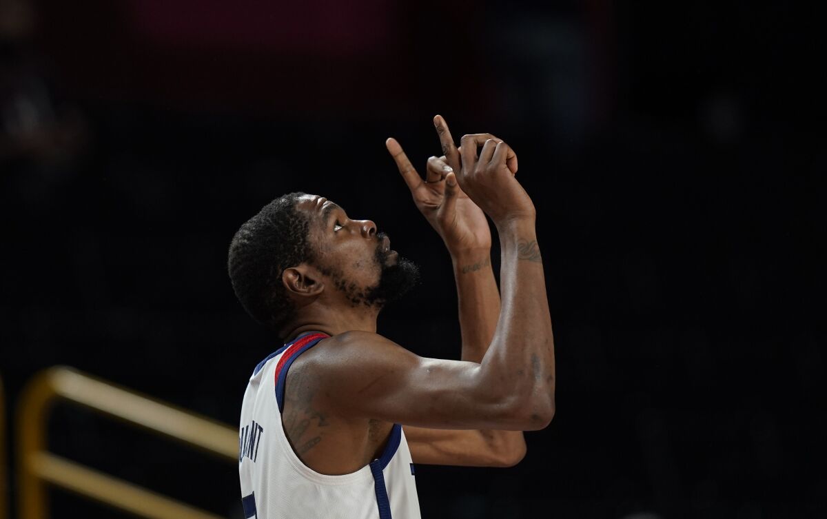 United States' Kevin Durant (7) reacts at the start of the men's basketball gold medal game between France and the United States at the 2020 Summer Olympics, Saturday, Aug. 7, 2021, in Saitama, Japan. (AP Photo/Eric Gay)