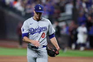 NEW YORK, NEW YORK - OCTOBER 18: Jack Flaherty #0 of the Los Angeles Dodgers leaves the field.