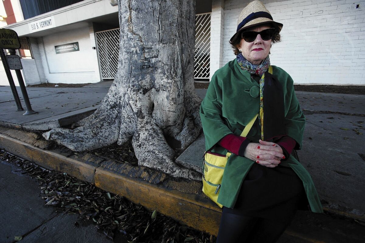 Deborah Murphy, executive director of Los Angeles Walks, a pedestrian advocacy group, is trying to get the city to repair sidewalks as well as the streets.