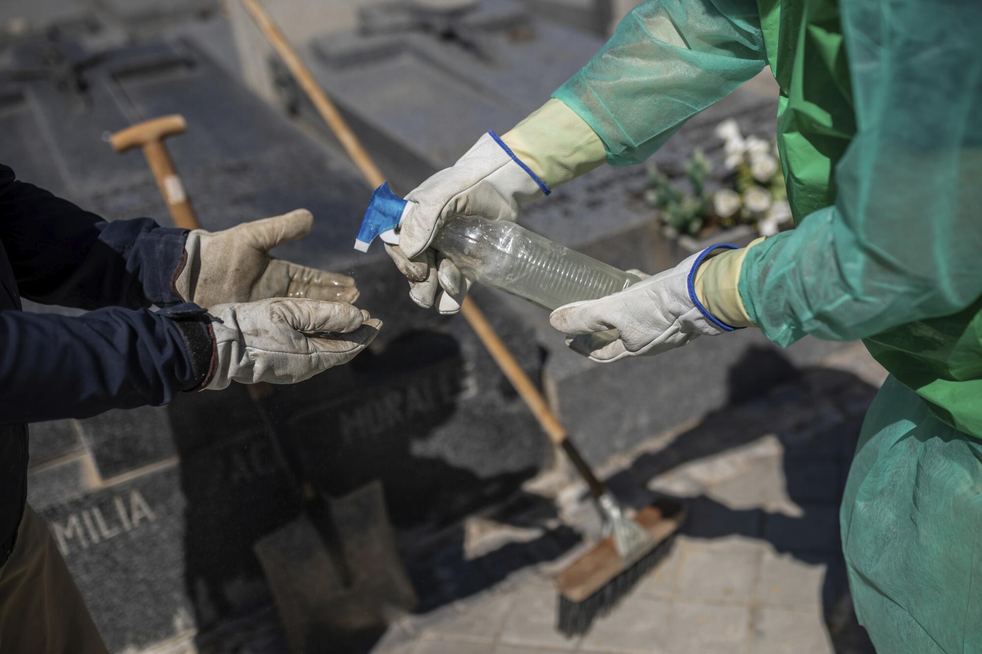 SPAIN:  Undertakers use a homemade sanitizer.