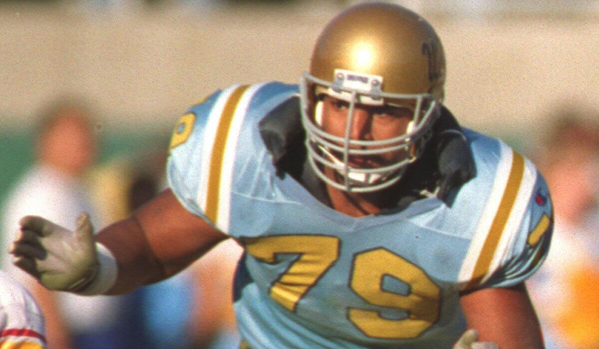 UCLA offensive tackle Jonathan Ogden made the Football Writers Assn. of America's 75th Anniversary All-America team.