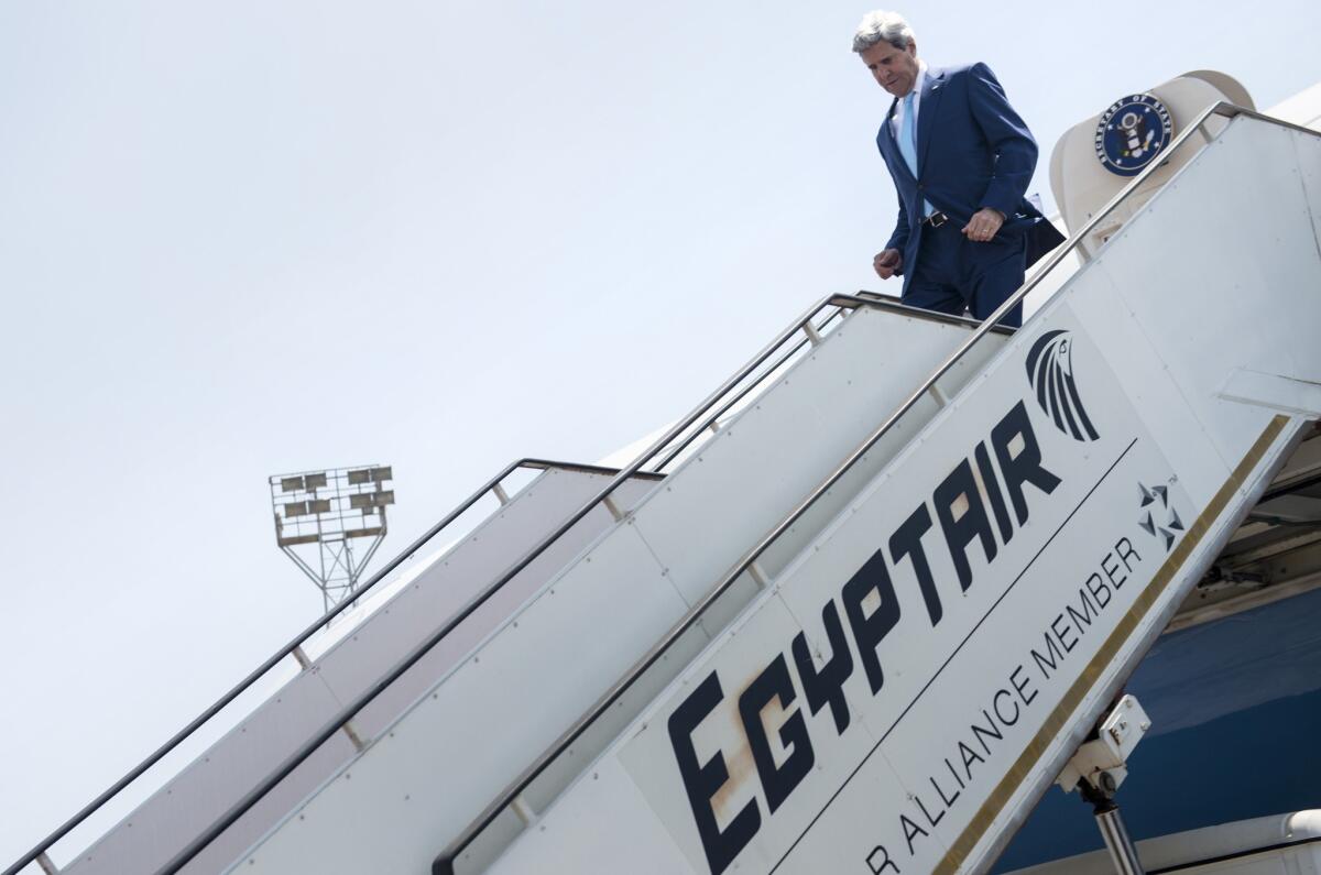 Secretary of State John F. Kerry arrives at Cairo International Airport.