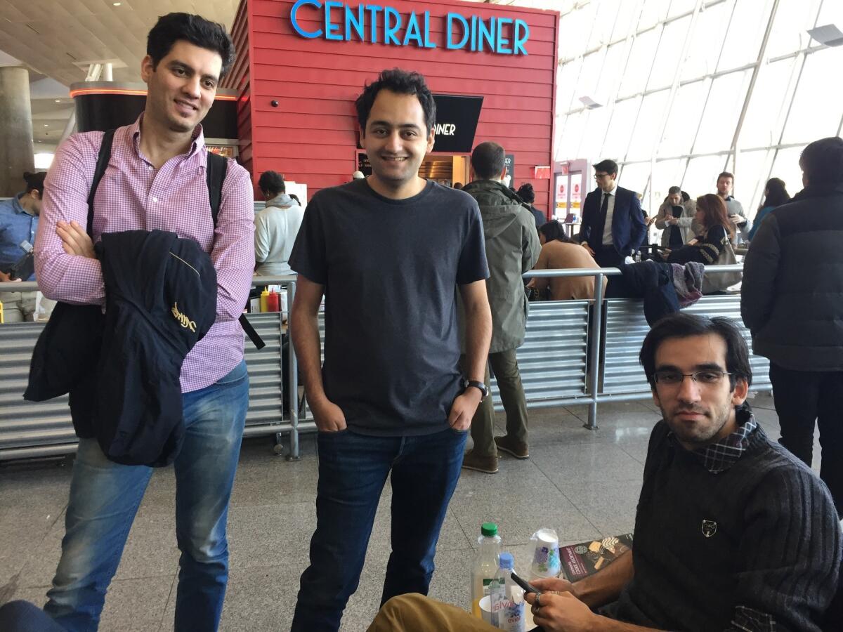 Iranian students in front of a makeshift law office in JFK's Terminal 4.