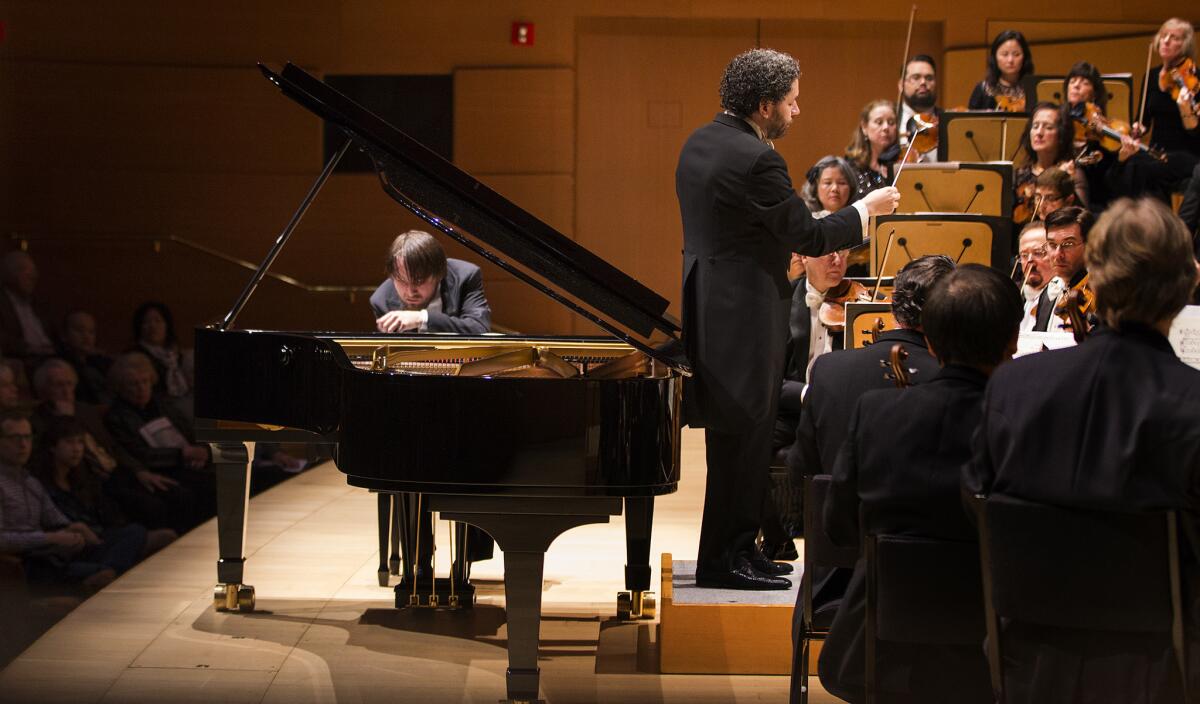 Daniil Trifonov is soloist in Rachmaninoff's Piano Concerto No. 3 with Gustavo Dudamel conducting the Los Angeles Philharmonic at the Walt Disney Concert Hall Thursday night.