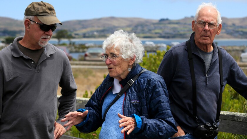 Times columnist Steve Lopez, left, with Lucy Kortum, whose late husband Bill Kortum helped lead the seminal battle to protect public access to the California coast, and environmentalist Pete Leveque.