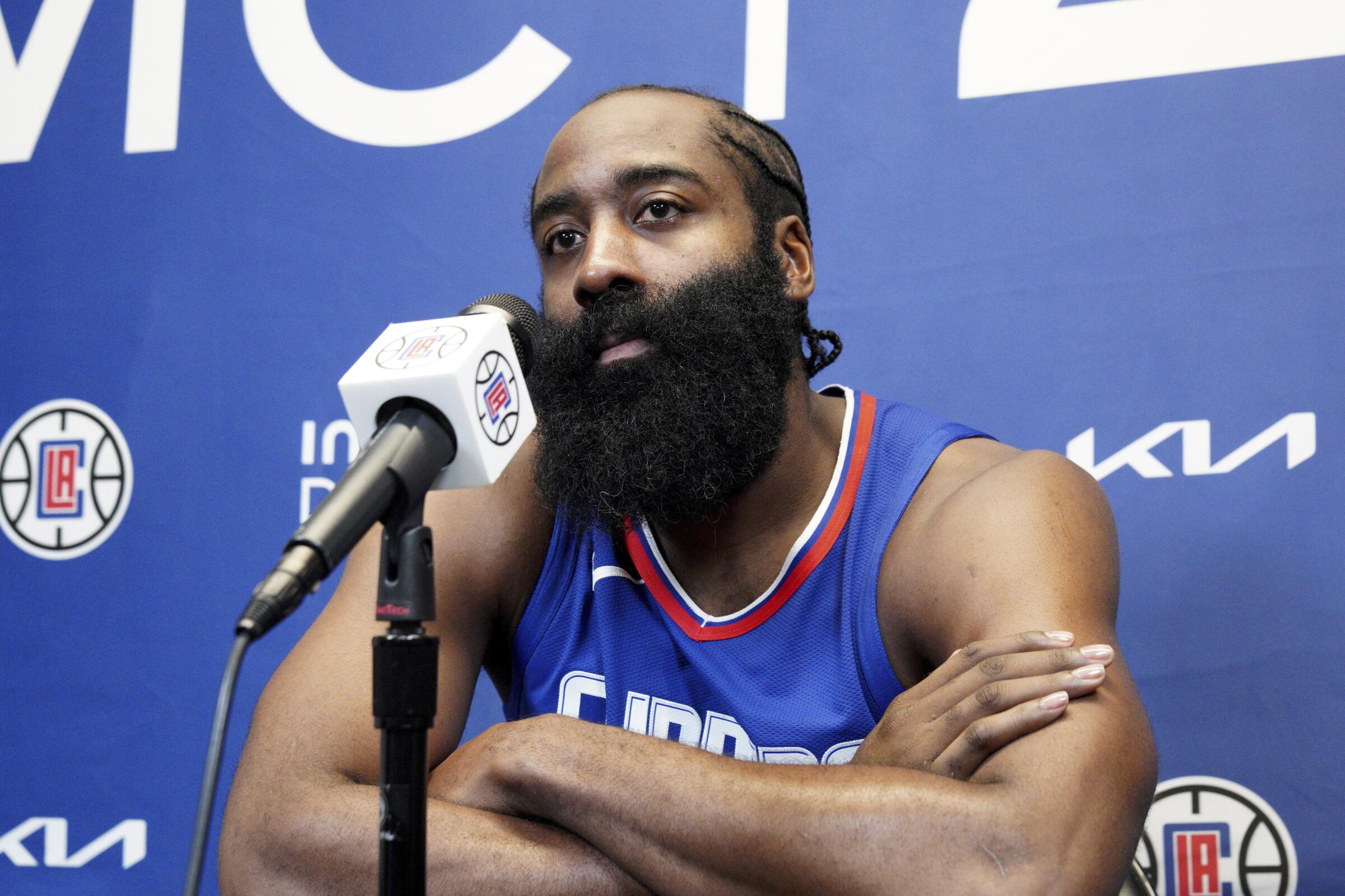 James Harden answers questions during a news conference on Thursday. 
