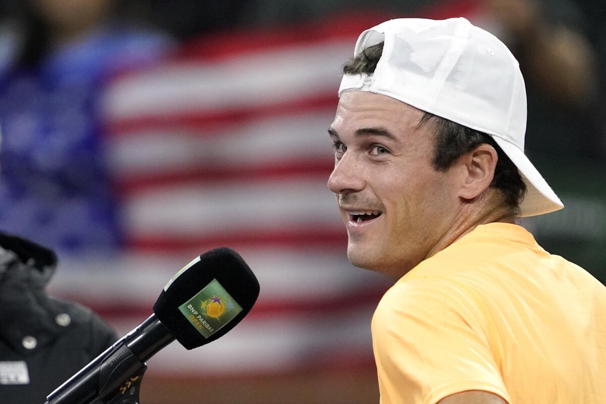 Tommy Paul speaks to the crowd after defeating Alexander Zverev on Sunday at Indian Wells Tennis Garden.