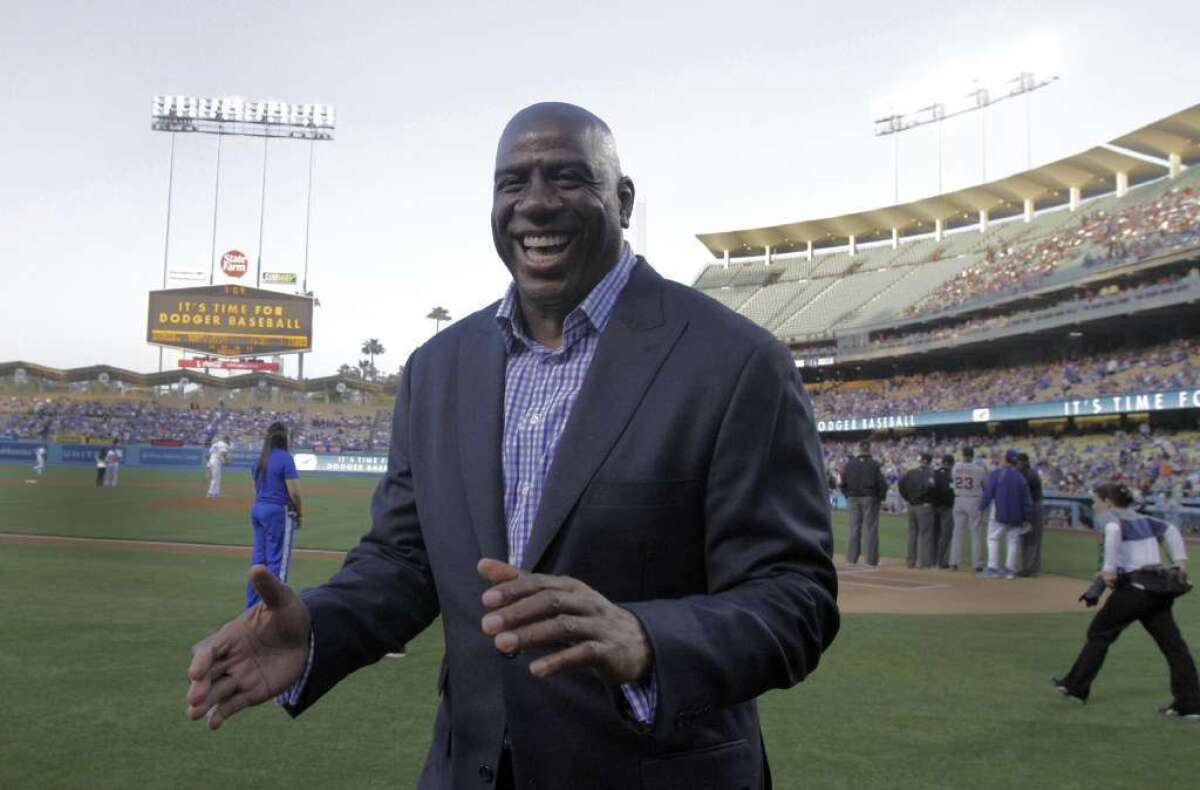 Dodgers co-owner Magic Johnson is "very excited" to watch outfield prospect Yasiel Puig.