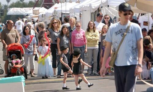 Children perform at dance routine at the Mission West Fall Street Festival on Mission Street in South Pasadena.