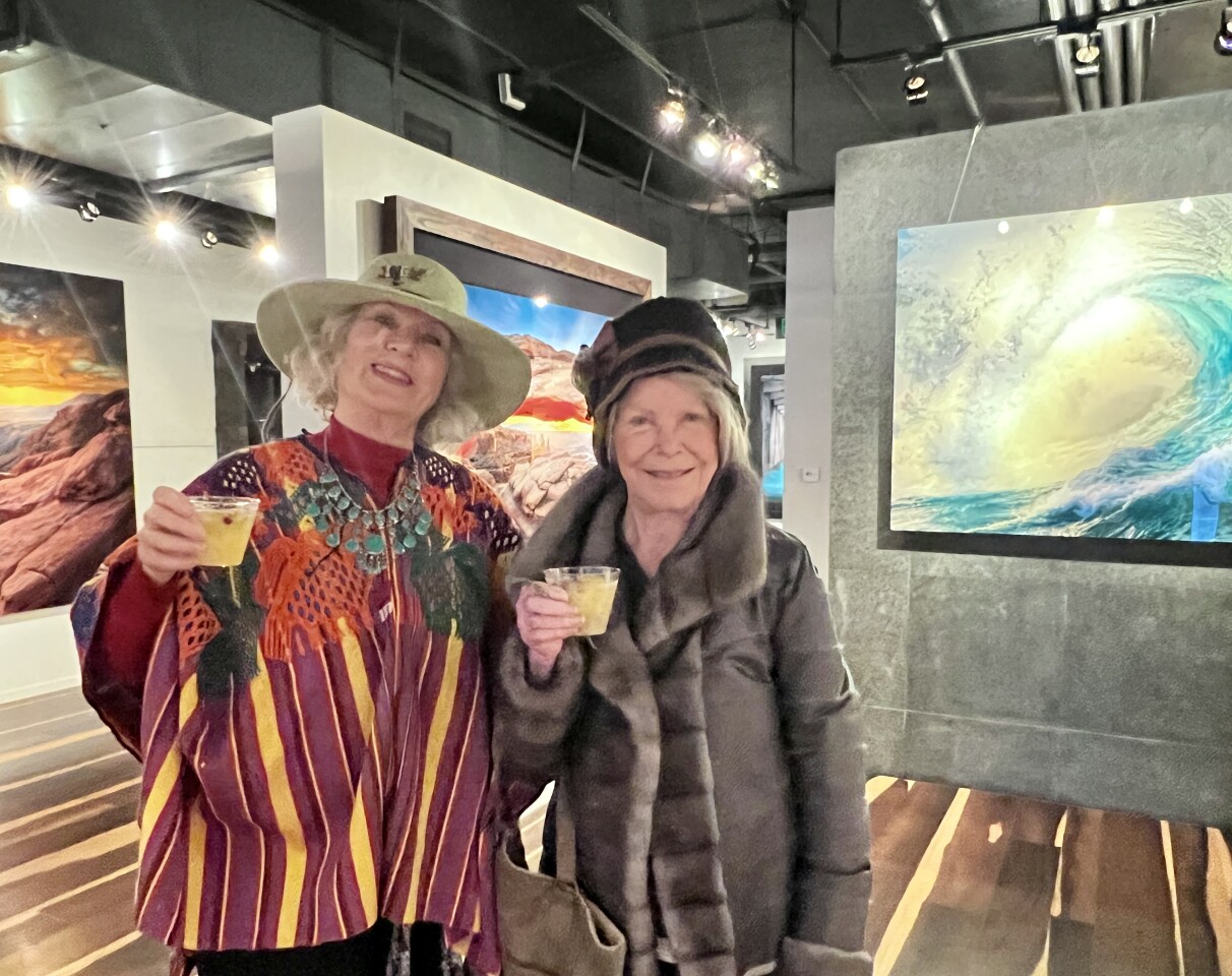 Christina Williams and Anita Brynolf hold their Mermaids & Cowboys cocktails at Lik Fine Art.