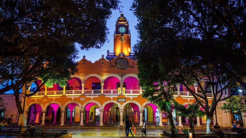 Merida, Mexico, invites visitors to wander its streets, enjoying its candy-colored buildings and its Yucatecan cuisine.