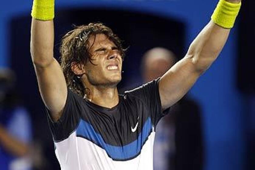 Rafael Nadal celebrates after outlasting Fernando Verdasco in their semifinal match at the Australian Open in Melbourne.