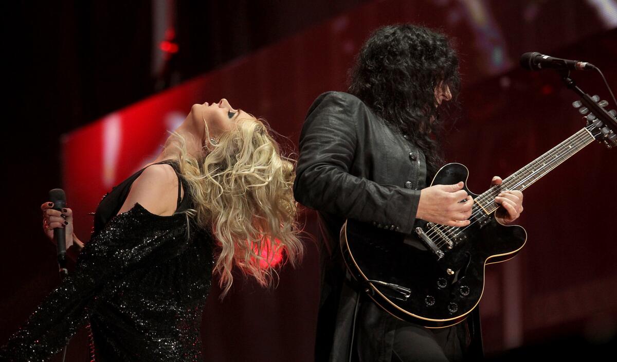 Taylor Momsen, left, fronts the New York City-based rock band The Pretty Reckless during a performance at Rock in Rio in Las Vegas on May 8.