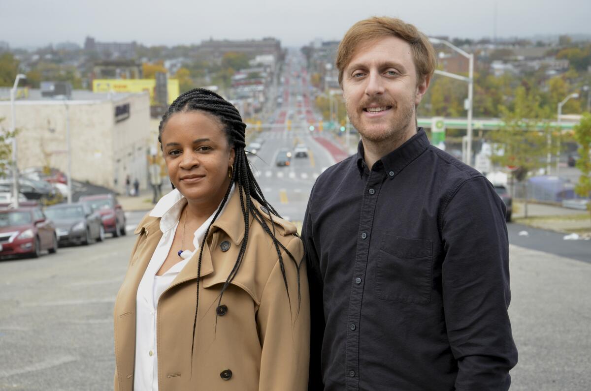 This photo provided by Chronicle of Philanthropy shows co-founder of Baltimore Beat Lisa Snowden-McCray, left, and Adam Holofcener of the Lillian Holofcener Charitable Foundation, photographed in Baltimore, in October 2022. Holofcener and his family foundation gave $1 million to revive the newspaper, which focuses on the city’s Black community. (Michael Theis/Chronicle of Philanthropy via AP)