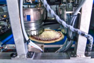 Inside view of an automated pizza making machine