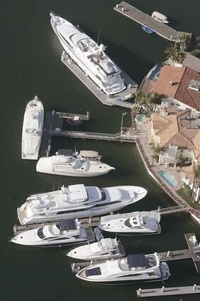 LIQUID REAL ESTATE: Marinas are going upscale to accommodate super-size yachts while small boats are getting pushed out.