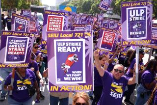 LOS ANGELES, CA - SEPTEMBER 24, 2024 - Hundreds of Los Angeles County SEIU 721 members rally to announce overwhelming support for an Unfair Labor Practice (ULP) strike authorization vote during a rally in front of the Kenneth Hahn Hall of Administration in downtown Los Angeles on September 24, 2024. Dozens of SEIU 721 county workers shut down a Board of Supervisors meeting for several minutes inside the Hall of Administration. "We have had it with LA County's attempts at union busting and we are ready to strike," said SEIU 721 President David Green, a Children's Social Worker with the LA County Dept. of Children & Family Services for more than two decades. Though segments of LA County's workforce have come close to striking - most recently inMay of 2022, when thousands of nurses reached an eleventh hour deal over stronger job protections and better compensation - a full-fledged strike of SEIU 721-represented bargaining units has not taken place in decades. This time, a ULP strike would include almost all of the LA County workforce and impact most services within the County's 4,751 square mile service area. (Genaro Molina/Los Angeles Times)