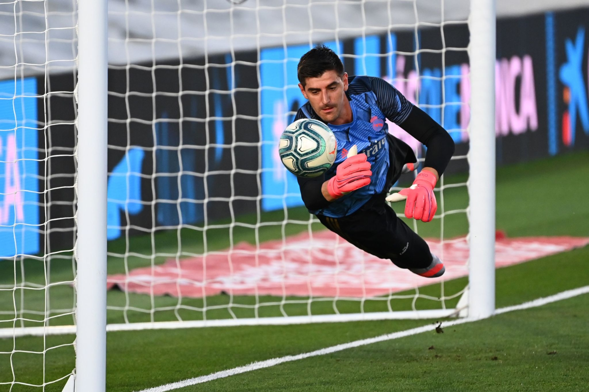 Real Madrid's Belgian goalkeeper Thibaut Courtois warms up before the Spanish League football match.