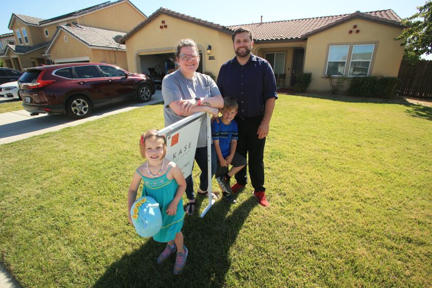 Bakersfield, CA - May 28: Steven Wolf his wife Katherine and their children Rebekah, 4, and Everett, 6, are selling their home they purchased in December 2022. They stretched their budget to buy a home in Bakersfield thinking they could quickly refinance when rates dropped. But that hasn't happened and the Wolfs are stuck with an uncomfortable mortgage payment. in NW Bakersfield on Tuesday, May 28, 2024 in Bakersfield, CA. (Alex Horvath / Los Angeles Times)
