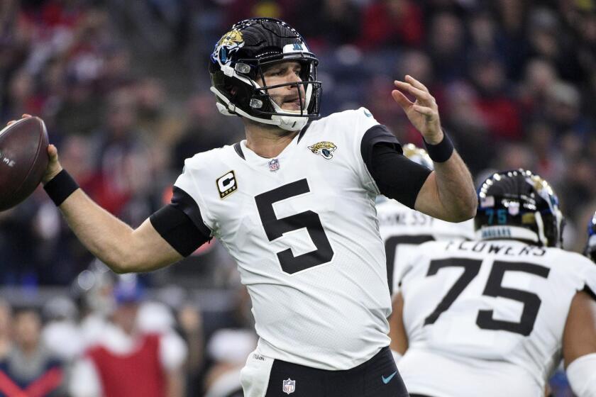 FILE - In this Dec. 30, 2018, file photo, Jacksonville Jaguars quarterback Blake Bortles throws against the Houston Texans during the first half of an NFL football game in Houston. Bortles has agreed to a one-year deal to become Jared Goffs backup with the Los Angeles Rams. (AP Photo/Eric Christian Smith, File)