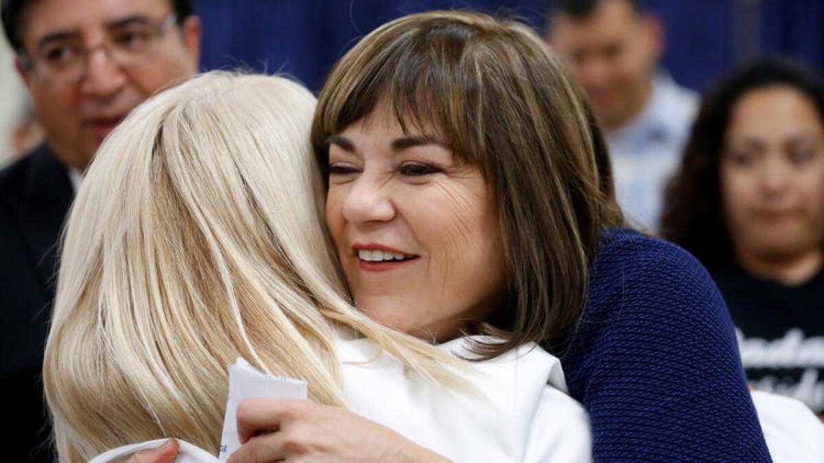 U.S. Senate candidate Rep. Loretta Sanchez (D-Orange), hugs supporters at her election night party on Tuesday.