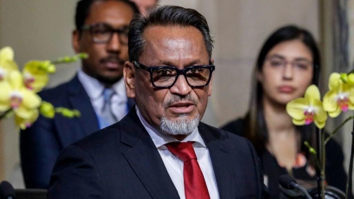 L.A. City Councilman Gil Cedillo speaks as the council considers his motion to make Los Angeles a "city of sanctuary" on Friday.