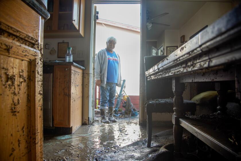 Resident Roy Gouge 63, looking at the damage to his home in National City on Tuesday, Jan. 23, 2024 in San Diego, California.