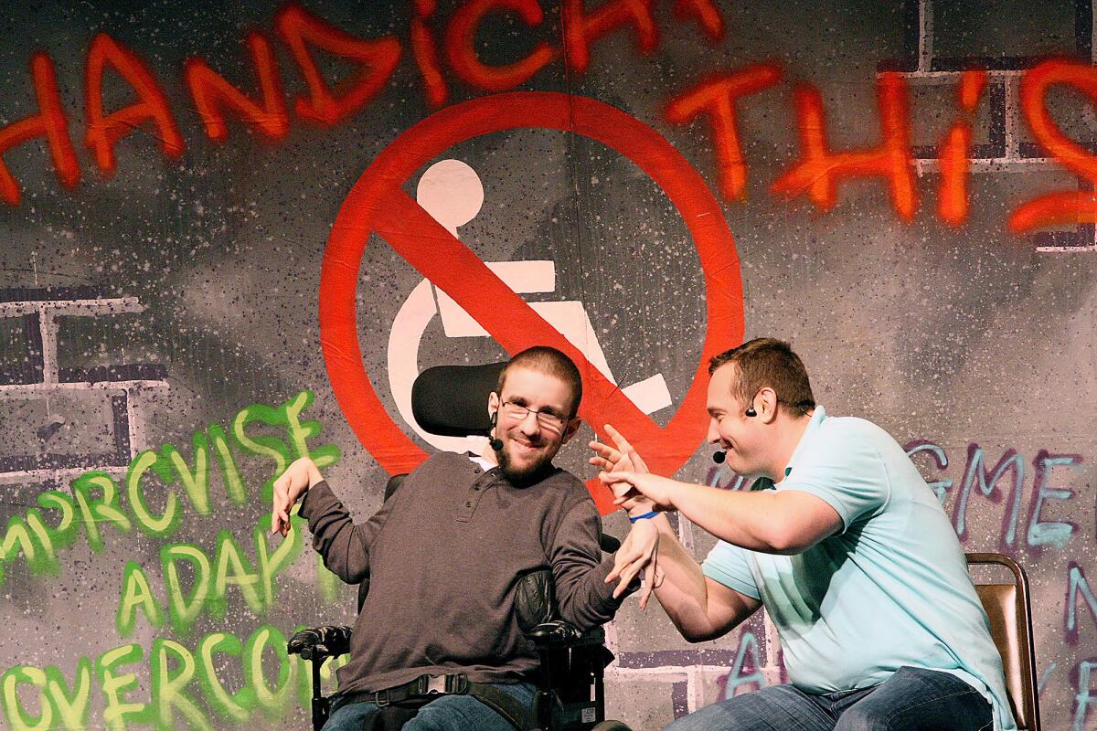Mike Berkson and Tim Wambach talk about their lives together during a showing of their play "Handicap This!" at Glendale Community College on Monday, March 2, 2014.