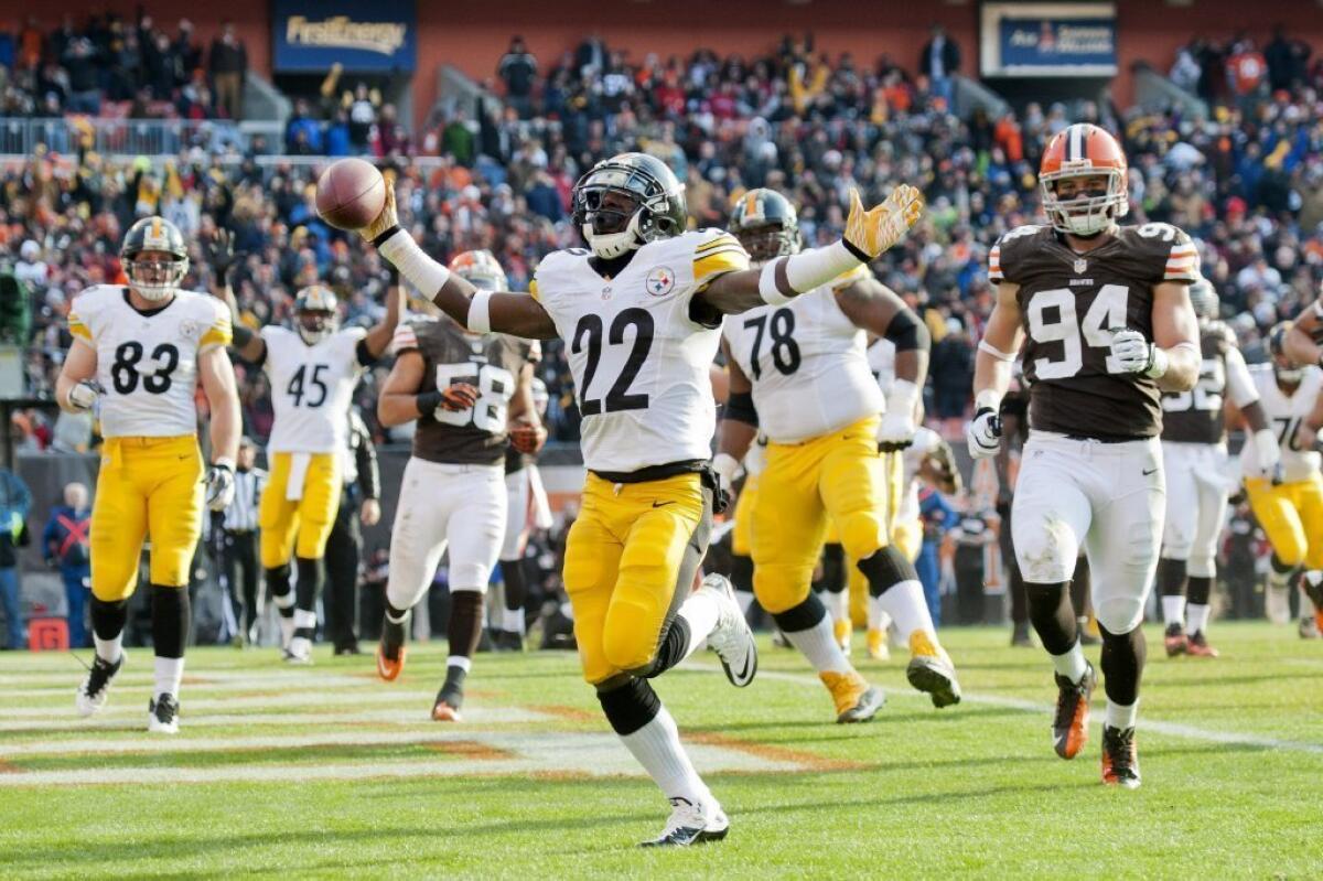 Chris Rainey scores a touchdown against the Cleveland Browns on Nov. 25.