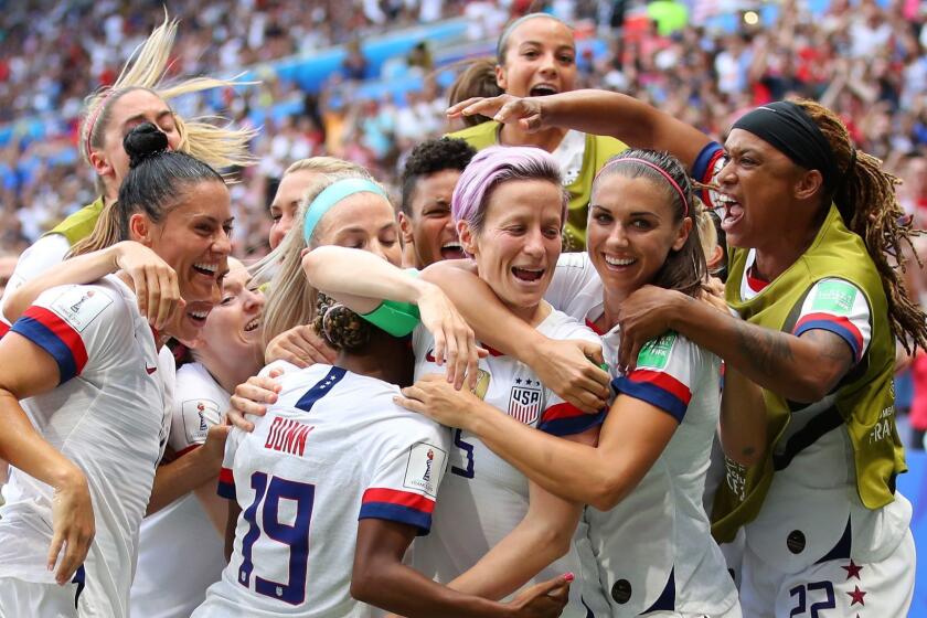 LYON, FRANCE - JULY 07: Megan Rapinoe of the USA celebrates with teammates after scoring her team's first goal during the 2019 FIFA Women's World Cup France Final match between The United States of America and The Netherlands at Stade de Lyon on July 07, 2019 in Lyon, France. (Photo by Richard Heathcote/Getty Images) *** BESTPIX *** ** OUTS - ELSENT, FPG, CM - OUTS * NM, PH, VA if sourced by CT, LA or MoD **