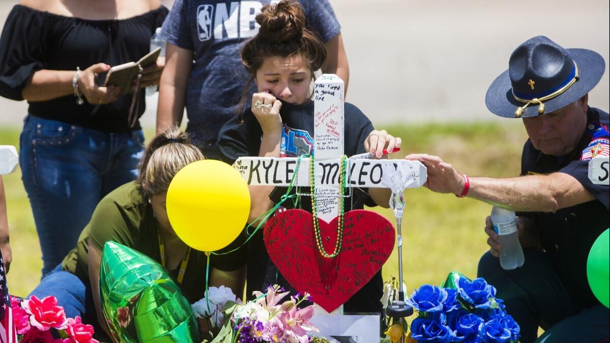 A memorial for Santa Fe High School freshman Aaron Kyle McLeod who was killed Friday during a shooting at the school, in Santa Fe, Texas.