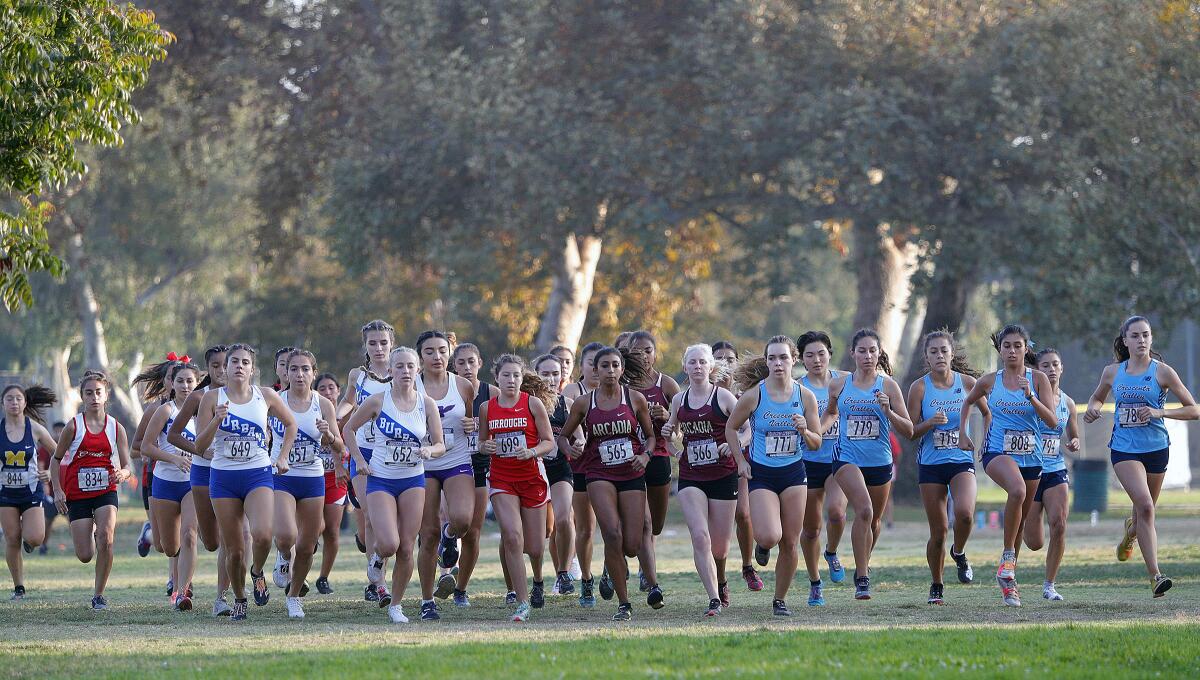 The group start of the girls' varsity in a Pacific League cross country meet at Arcadia Park in Arcadia on Thursday, November 7, 2019. This is the final league meet of the season.