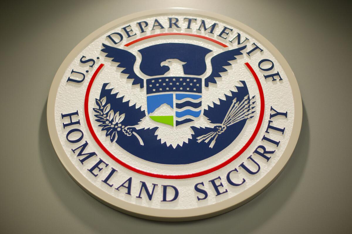Homeland Security logo is seen during a joint news conference in Washington.