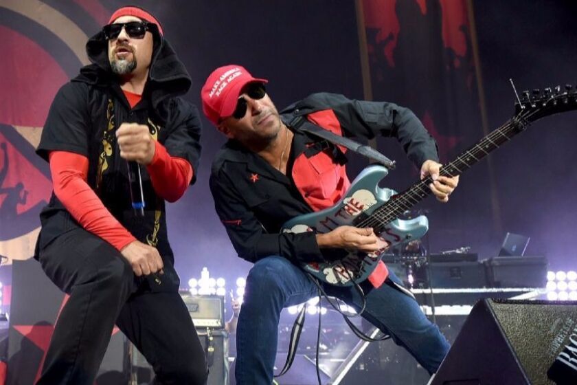 Rapper B-Real (left) and guitarist Tom Morello of Prophets of Rage perform at the Forum in Los Angeles on September 15, 2016. The new band concludes its first tour Oct. 15 in San Diego.