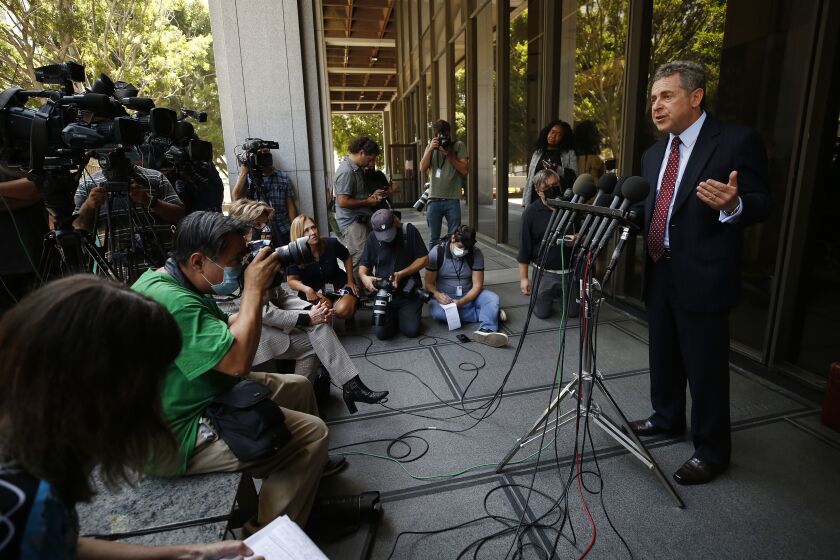 LOS ANGELES, CA - JULY 21: Criminal Defense Attorney Mark J. Werksman who is representing disgraced former film producer Harvey Weinstein talks outside Los Angeles Superior Court where Weinstein appeared for arraignment charged with sex-related counts involving five women between 2004 and 2013. Weinstein was extradited from New York to Los Angeles. "Today Harvey Weinstein was brought to LA stemming from an extradition warrant that was issued for several felony sexual assault charges,'' the Los Angeles Police Department tweeted. "After being medically cleared for booking, he was booked into custody (with) LA County Sheriff's.'' Superior Court on Wednesday, July 21, 2021 in Los Angeles, CA. (Al Seib / Los Angeles Times).