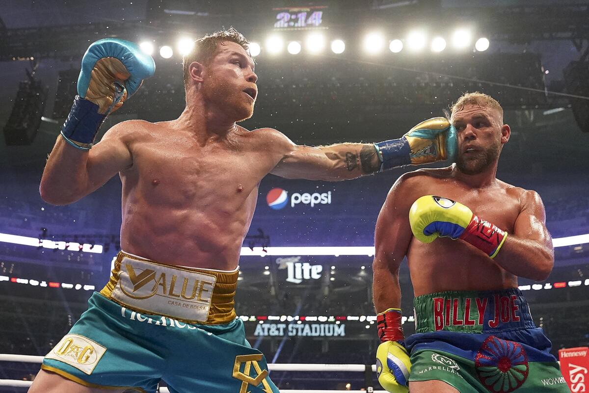 Canelo ?lvarez connects with Billy Joe Saunders' face during a unified super middleweight world championship match on May 8