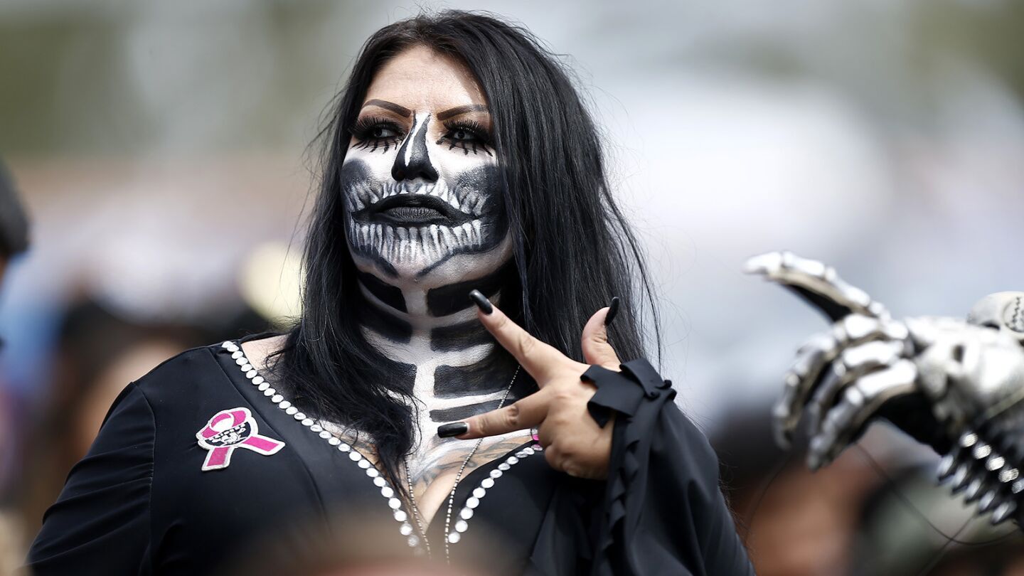 An Oakland Raiders fan looks on during a game against the Chargers at the StubHub Center in Carson on Oct. 7, 2018. (Photo by K.C. Alfred/San Diego Union-Tribune)