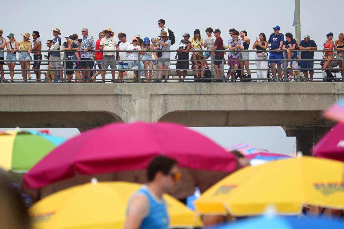 Fans watch the U.S. Open of Surfing in Huntington Beach in 2023.
