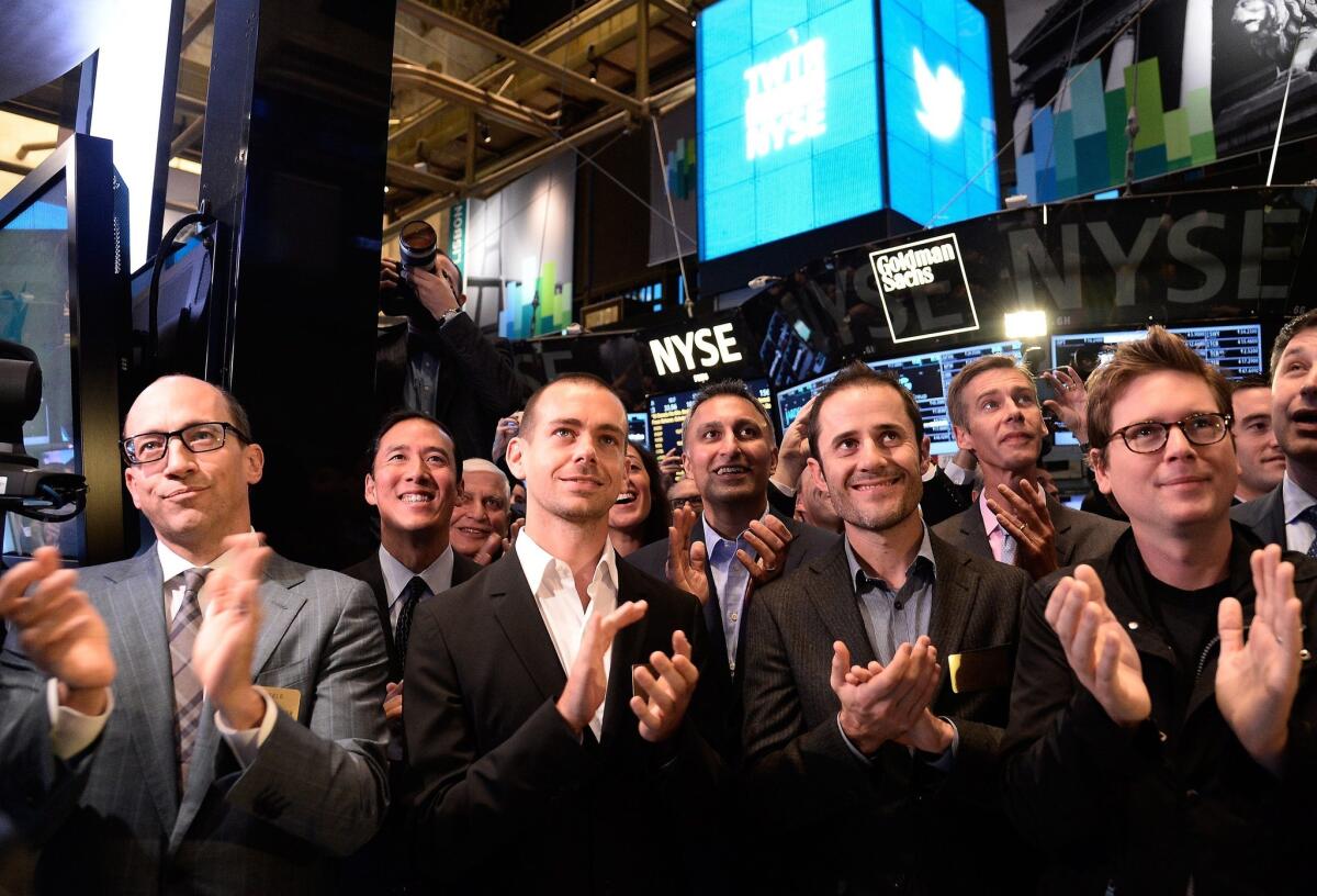 Twitter stock value has nearly tripled since its initial public offering last month. Above, Twitter executives at the New York Stock Exchange last month applaud as trading starts.