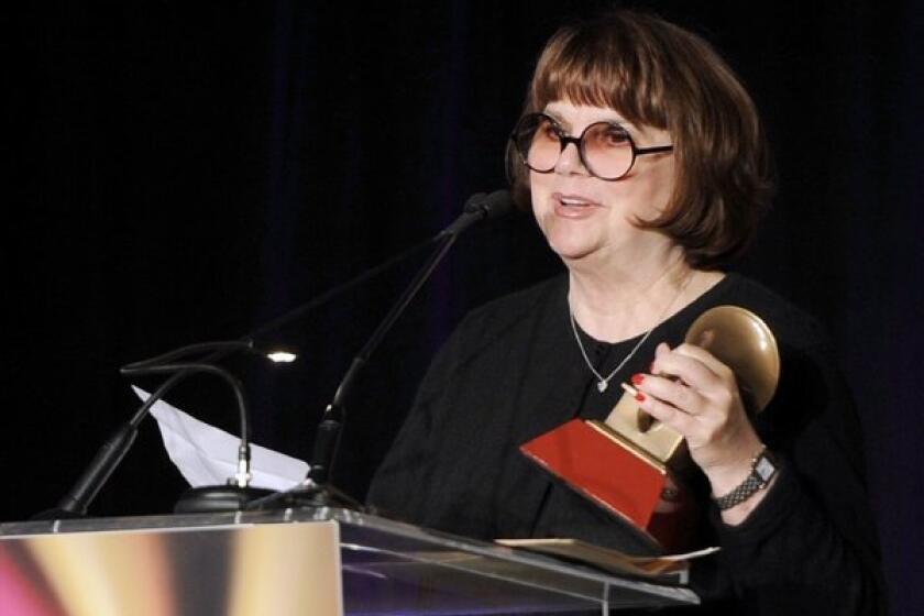 Linda Ronstadt, accepting an award two years ago, says she has Parkinson's disease and "can't sing a note."