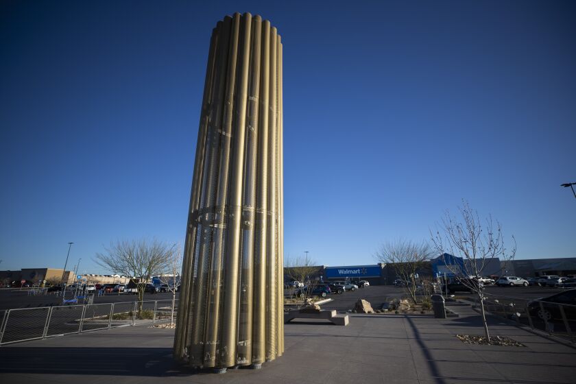 A towering memorial, in the form of a giant candle, to the victims of the August 2019 mass shooting in El Paso, Texas, is pictured on Wednesday, Feb. 8, 2023. Patrick Crusius, the defendant in the deaths of 23 people at an El Paso Walmart is expected to plead guilty during a re-arraignment hearing in federal court. (AP Photo/Andrés Leighton)
