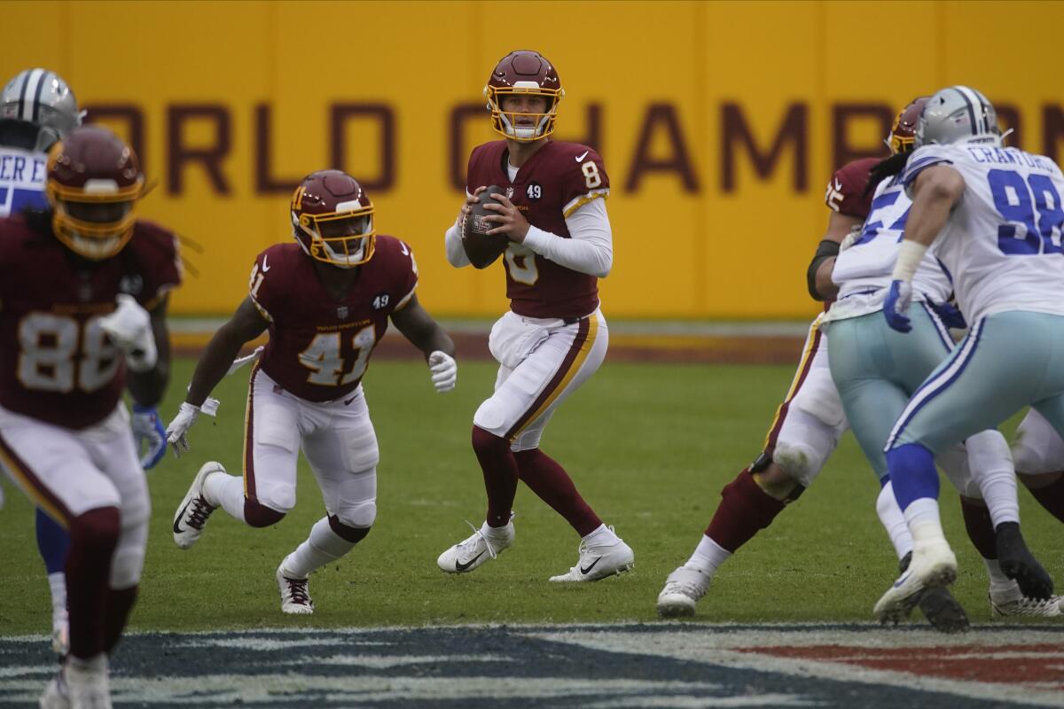 Washington quarterback Kyle Allen looks to pass against the Dallas Cowboys on Sunday.