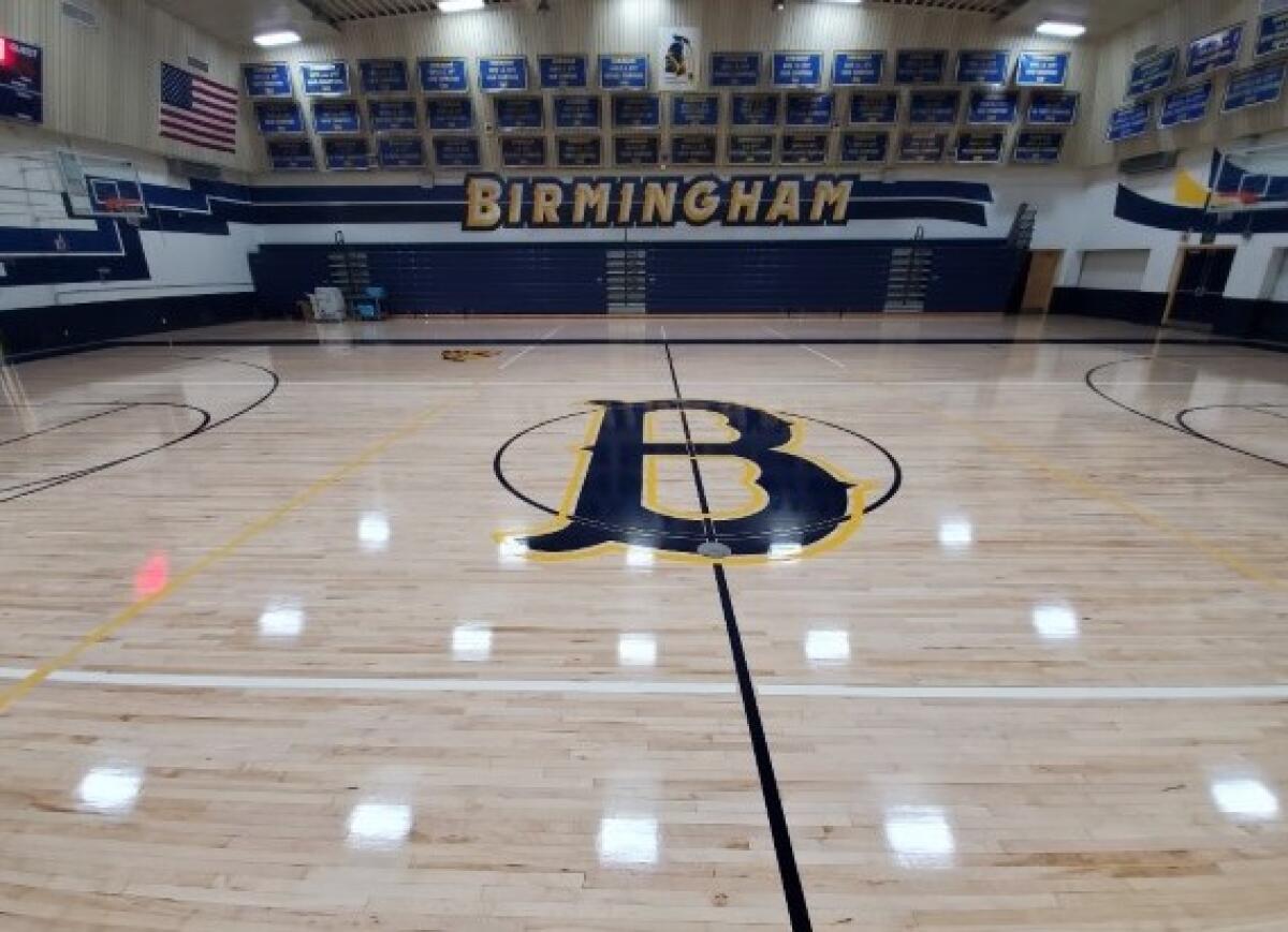 Birmingham has a new gym floor with a big B at center court.