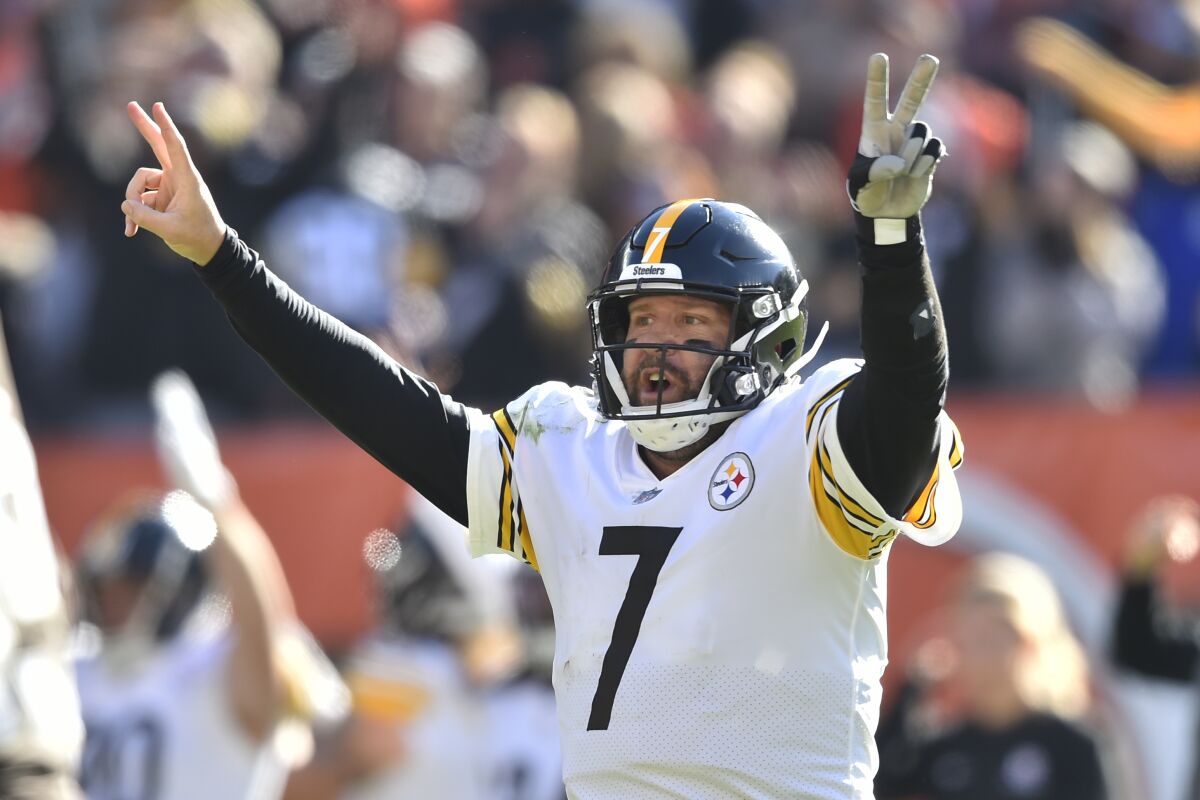 Pittsburgh Steelers quarterback Ben Roethlisberger celebrates after a 2-yard touchdown pass to tight end Pat Freiermuth (88) during the second half of an NFL football game against the Cleveland Browns, Sunday, Oct. 31, 2021, in Cleveland. (AP Photo/David Richard)