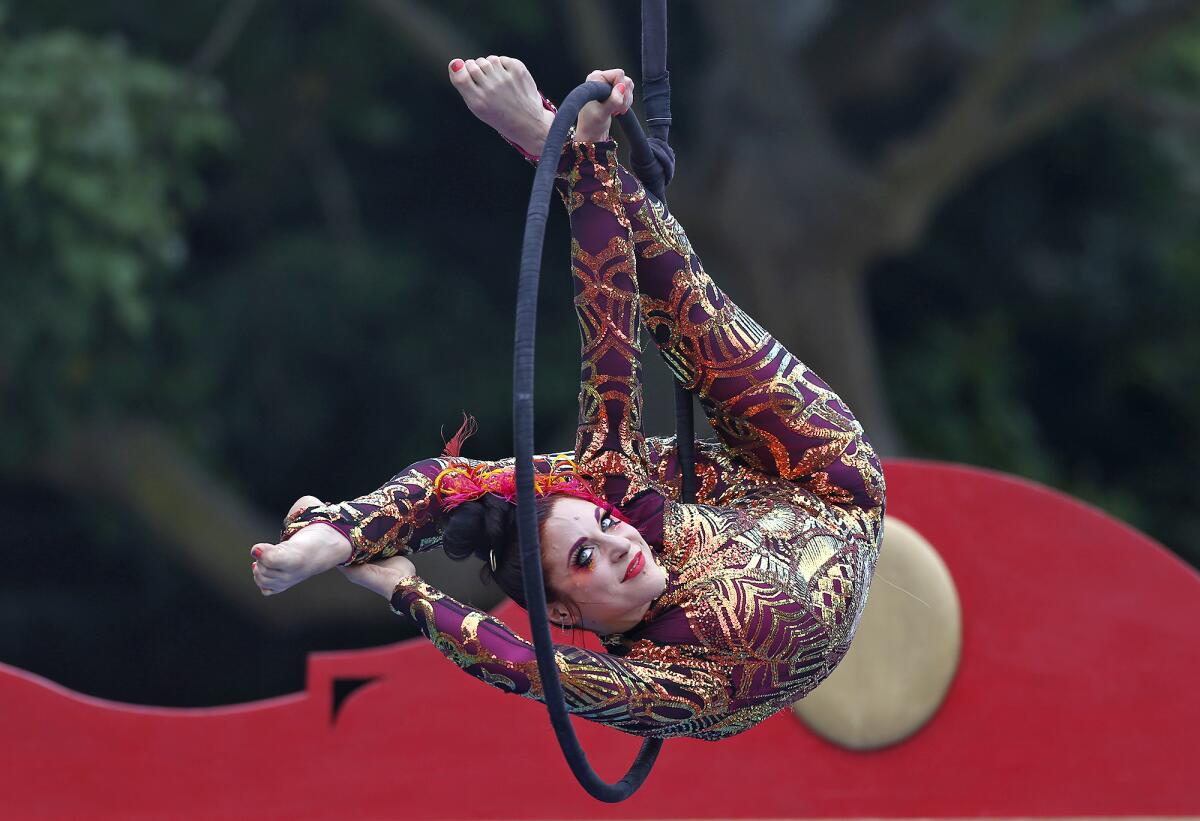 Aerialist Dworia Galilea twirls and twists during her act at the Circus Bella "Bananas" show in Laguna Beach on Saturday.