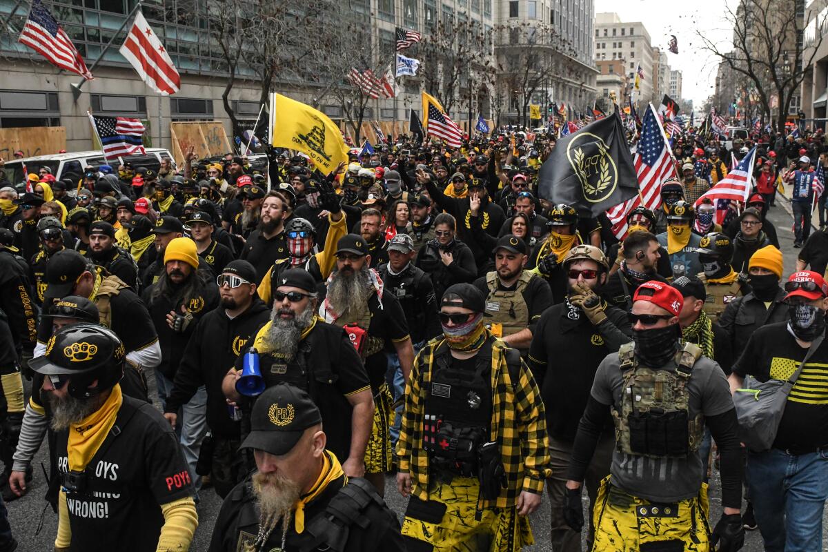 Members of the Proud Boys march during a protest on in Washington, DC.
