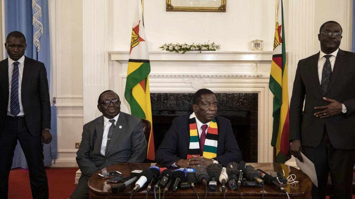 President Emmerson Mnangagwa conducts a news conference on Aug. 3, 2018 in Harare. His inauguration, which was scheduled for Sunday, has been postponed.