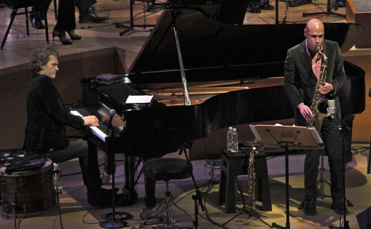 Brad Mehldau, left, with Joshua Redman onstage at Walt Disney Concert Hall in 2011.