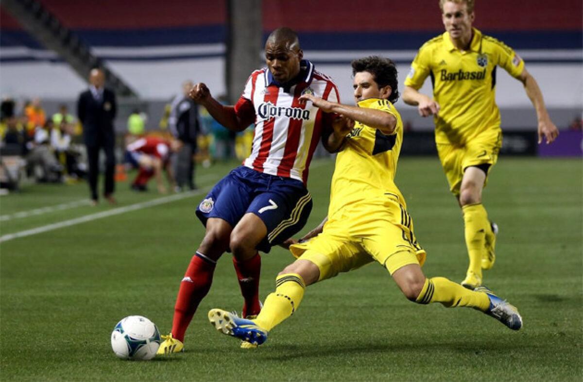 Chivas USA's Tristan Bowen, left, scored the team's second goal. Pictured: Bowen moves the ball down the field against the Columbus Crew in March.